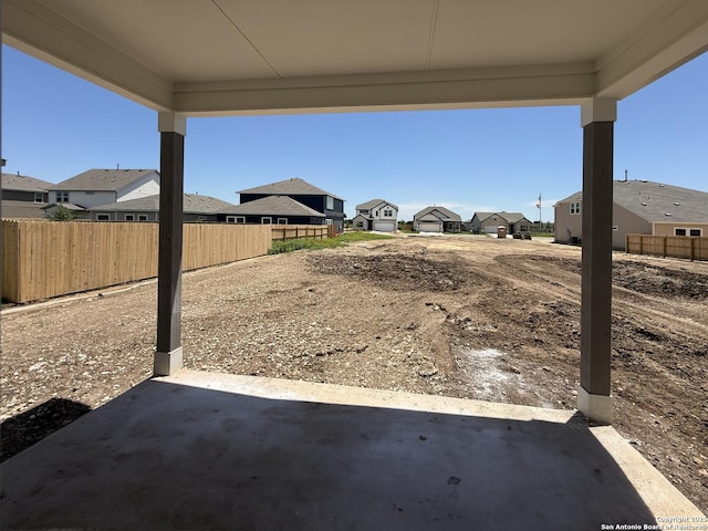14724 Sycamore Xing, San Antonio, TX 78252 - view of patio / terrace with a residential view and fence