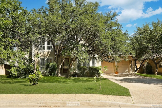 13410 Heights, San Antonio, TX 78230 - obstructed view of property featuring a garage, driveway, and a front yard
