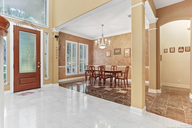 13410 Heights, San Antonio, TX 78230 - foyer entrance featuring baseboards, ornate columns, a chandelier, and ornamental molding