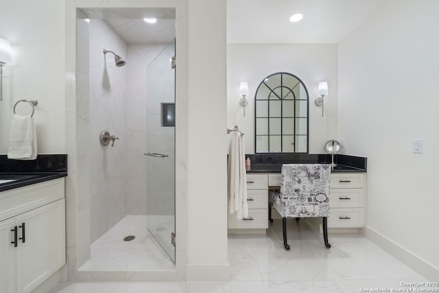610 E Market St Unit 3110, San Antonio, TX 78205 - full bathroom featuring marble finish floors, baseboards, vanity, and a marble finish shower