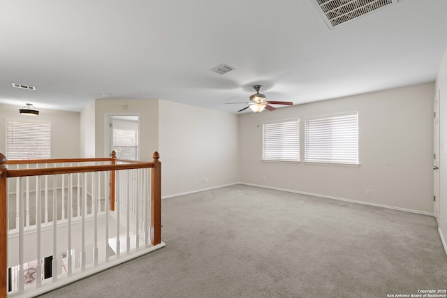 17223 Darlington Run, San Antonio, TX 78247 - carpeted empty room with healthy amount of natural light, baseboards, and a ceiling fan