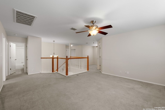 17223 Darlington Run, San Antonio, TX 78247 - carpeted spare room featuring ceiling fan, a chandelier, and baseboards