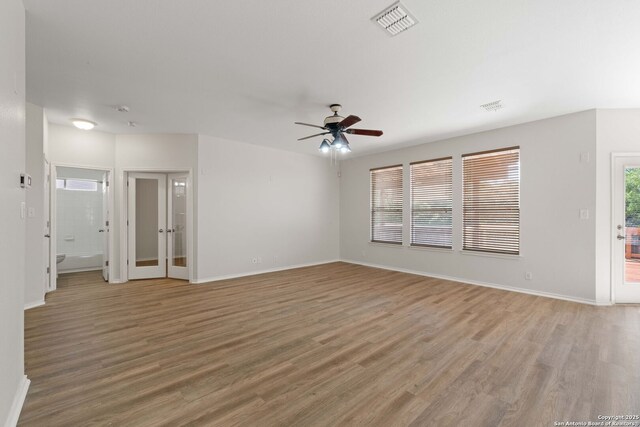 17223 Darlington Run, San Antonio, TX 78247 - empty room with light wood finished floors, ceiling fan, and baseboards
