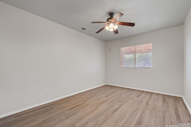 17223 Darlington Run, San Antonio, TX 78247 - empty room featuring wood finished floors, baseboards, and ceiling fan