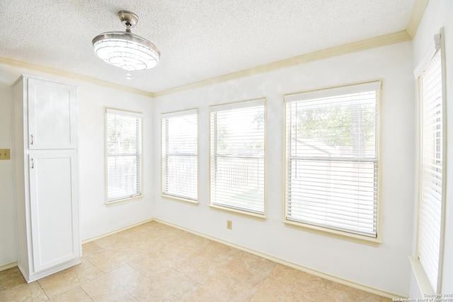 15850 Marisa Pl, San Antonio, TX 78247 - unfurnished dining area with a textured ceiling, crown molding, and baseboards