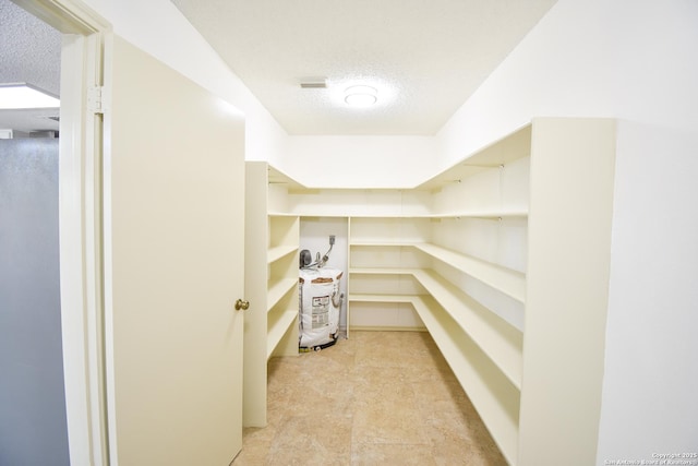 15850 Marisa Pl, San Antonio, TX 78247 - pantry featuring water heater