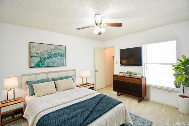 15850 Marisa Pl, San Antonio, TX 78247 - bedroom featuring carpet, a textured ceiling, and a ceiling fan