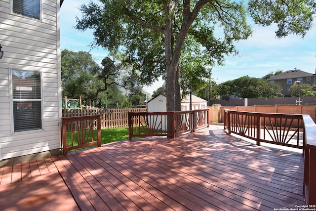 15850 Marisa Pl, San Antonio, TX 78247 - wooden deck with a fenced backyard, an outbuilding, and a storage shed