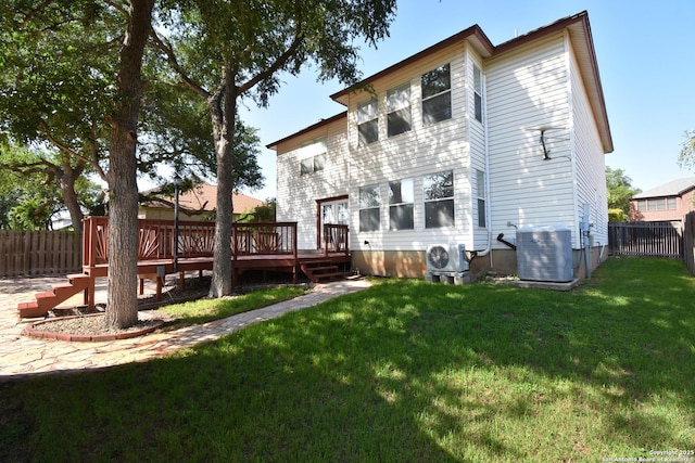 15850 Marisa Pl, San Antonio, TX 78247 - back of house with central AC unit, a wooden deck, and ac unit