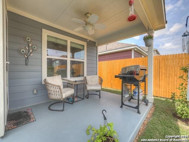 4047 Legend Mdws, New Braunfels, TX 78130 - view of patio featuring fence and a ceiling fan