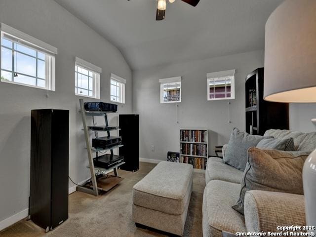 4047 Legend Mdws, New Braunfels, TX 78130 - carpeted living area featuring ceiling fan, vaulted ceiling, and baseboards