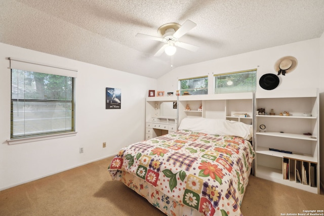 11400 Mission Trce, San Antonio, TX 78230 - bedroom with carpet flooring, a textured ceiling, a ceiling fan, and lofted ceiling