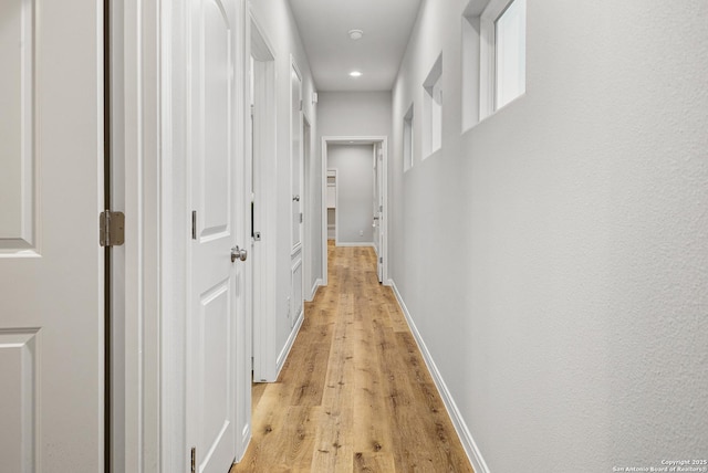 503 Linden, San Antonio, TX 78211 - corridor featuring light wood-style flooring, baseboards, and recessed lighting