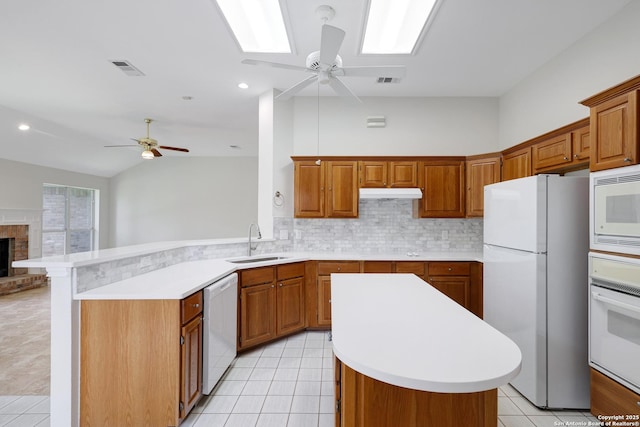 4635 Shavano Birch, San Antonio, TX 78230 - kitchen with white appliances, ceiling fan, a sink, light countertops, and recessed lighting