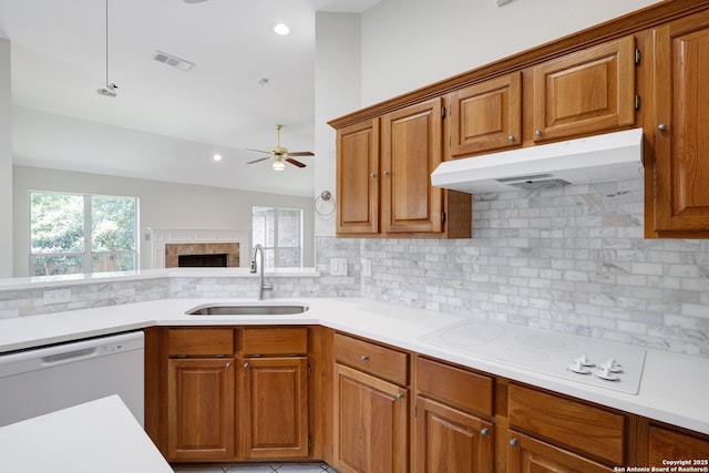 4635 Shavano Birch, San Antonio, TX 78230 - kitchen featuring a sink, under cabinet range hood, white appliances, ceiling fan, and light countertops
