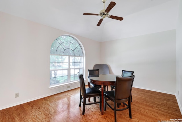 4635 Shavano Birch, San Antonio, TX 78230 - dining room with wood finished floors, vaulted ceiling, a ceiling fan, and baseboards
