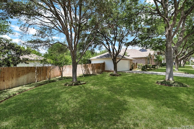 4635 Shavano Birch, San Antonio, TX 78230 - view of yard with driveway and an attached garage