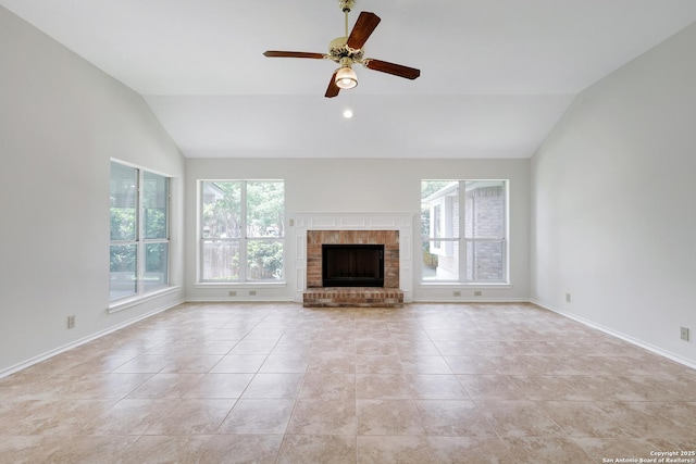 4635 Shavano Birch, San Antonio, TX 78230 - unfurnished living room with vaulted ceiling, plenty of natural light, light tile patterned floors, ceiling fan, and baseboards