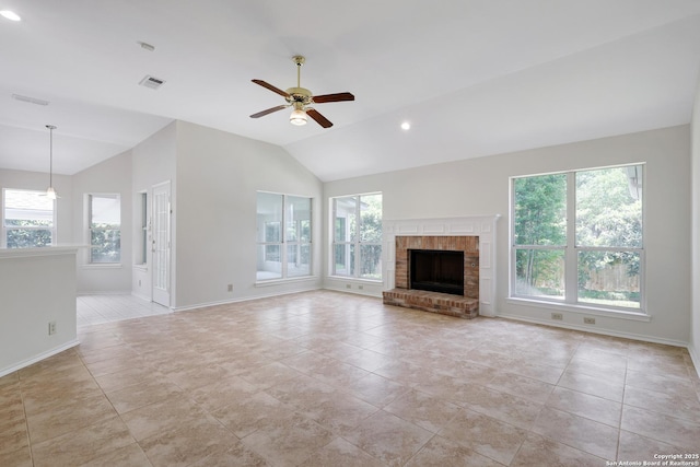 4635 Shavano Birch, San Antonio, TX 78230 - unfurnished living room with healthy amount of natural light, lofted ceiling, a ceiling fan, baseboards, and light tile patterned floors