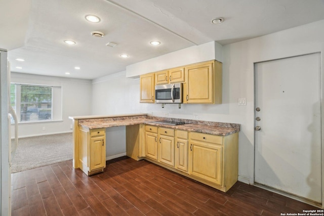 427 Indigo, San Antonio, TX 78216 - kitchen featuring stainless steel microwave, light brown cabinets, dark wood-type flooring, a peninsula, and recessed lighting