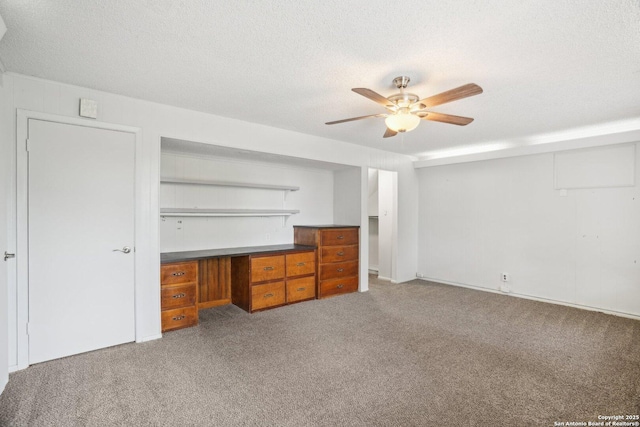 427 Indigo, San Antonio, TX 78216 - unfurnished bedroom featuring carpet floors, a textured ceiling, and ceiling fan
