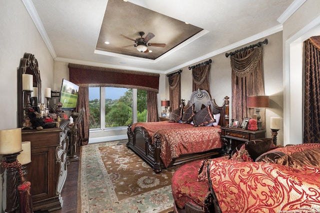 2219 Clubs Dr, Boerne, TX 78006 - bedroom featuring dark wood-type flooring, crown molding, a raised ceiling, baseboards, and ceiling fan