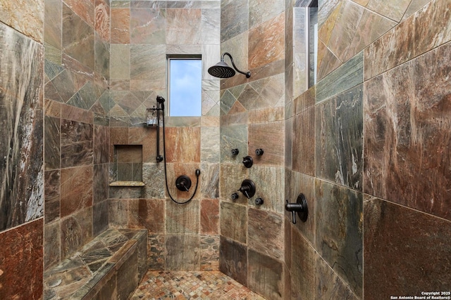 2219 Clubs Dr, Boerne, TX 78006 - bathroom featuring a tile shower