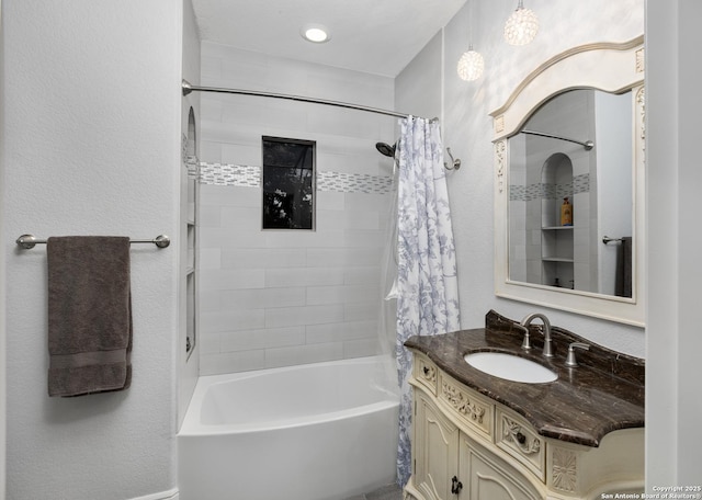 2219 Clubs Dr, Boerne, TX 78006 - full bathroom with shower / bath combination with curtain, vanity, and a textured wall