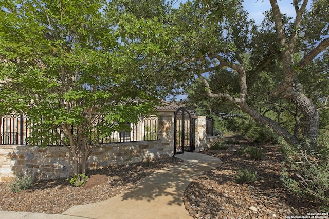 2219 Clubs Dr, Boerne, TX 78006 - view of front of house featuring a fenced front yard and a gate