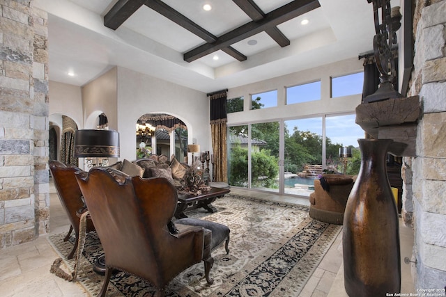 2219 Clubs Dr, Boerne, TX 78006 - living room with coffered ceiling, a high ceiling, beam ceiling, stone tile flooring, and recessed lighting