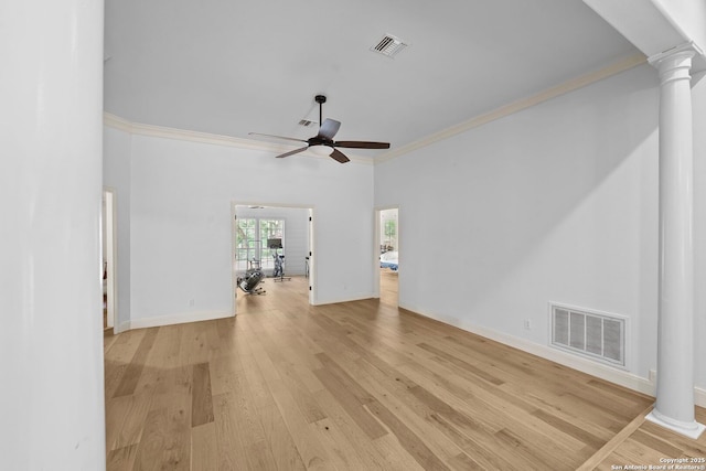 9403 Gardenia Bnd, San Antonio, TX 78266 - unfurnished living room with ornate columns, ornamental molding, a ceiling fan, wood finished floors, and baseboards