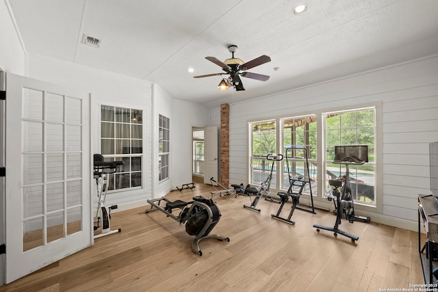 9403 Gardenia Bnd, San Antonio, TX 78266 - exercise room with recessed lighting, wood finished floors, ceiling fan, healthy amount of natural light, and wooden walls