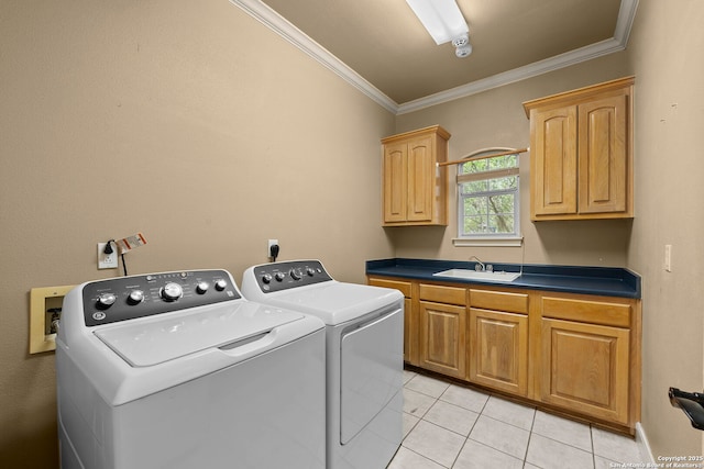 9403 Gardenia Bnd, San Antonio, TX 78266 - laundry area featuring washer and dryer, cabinet space, ornamental molding, and light tile patterned floors