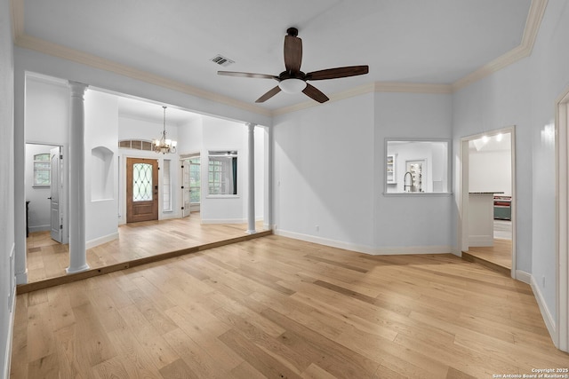 9403 Gardenia Bnd, San Antonio, TX 78266 - spare room featuring light wood-style floors, plenty of natural light, a chandelier, ceiling fan, and ornamental molding