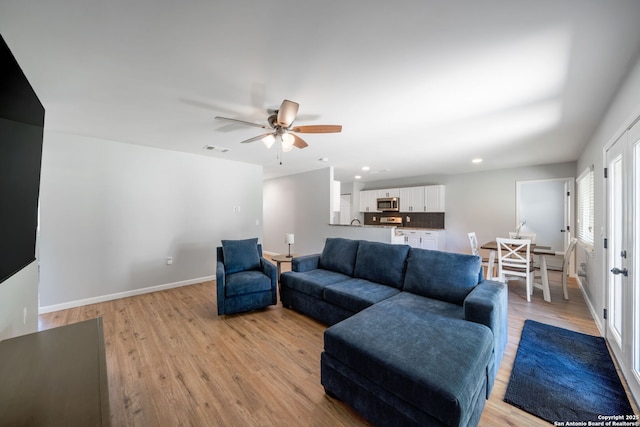 5902 Brambletree, San Antonio, TX 78247 - living area featuring light wood-type flooring, baseboards, recessed lighting, and ceiling fan