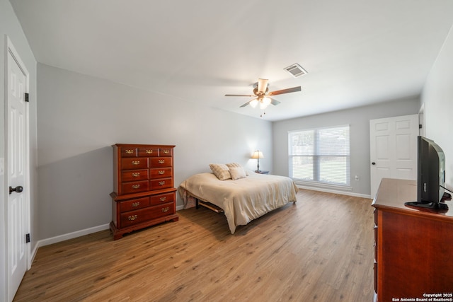 5902 Brambletree, San Antonio, TX 78247 - bedroom featuring light wood-style floors, baseboards, and ceiling fan