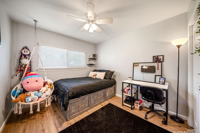 5902 Brambletree, San Antonio, TX 78247 - bedroom featuring wood finished floors, baseboards, and a ceiling fan