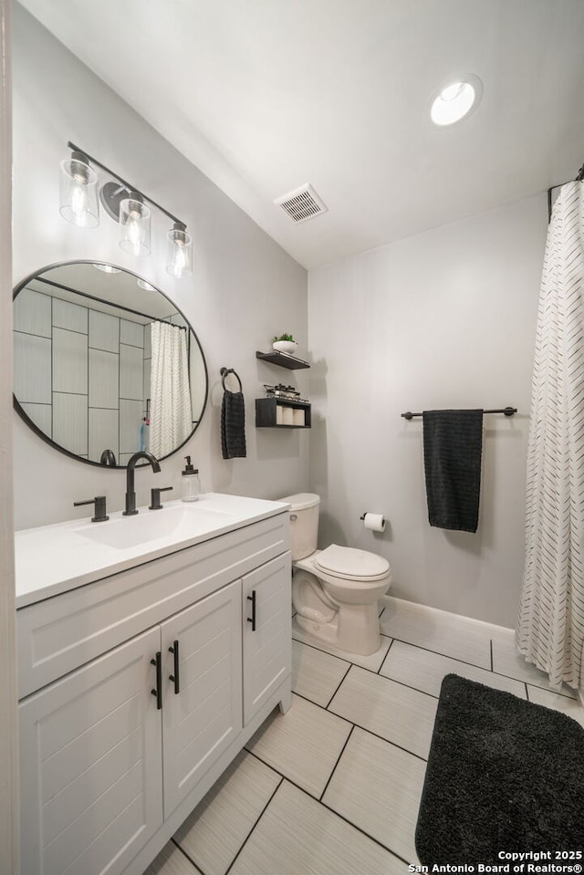 5902 Brambletree, San Antonio, TX 78247 - full bathroom featuring toilet, vanity, and tile patterned flooring