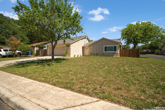 5902 Brambletree, San Antonio, TX 78247 - mid-century modern home with concrete driveway, board and batten siding, and a garage