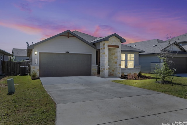 4540 Appaloosa, San Antonio, TX 78245 - single story home featuring stone siding, a garage, central air condition unit, driveway, and roof with shingles