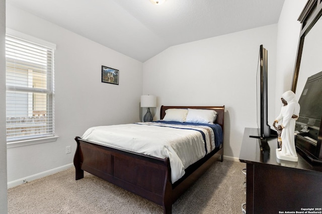 4540 Appaloosa, San Antonio, TX 78245 - bedroom with baseboards, vaulted ceiling, and carpet floors