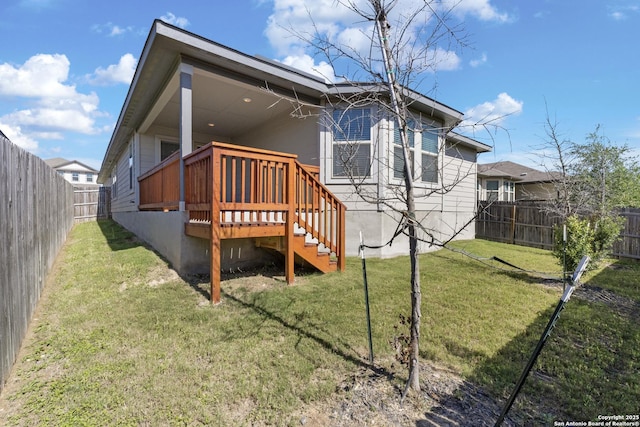 4540 Appaloosa, San Antonio, TX 78245 - rear view of house featuring a deck and stairway