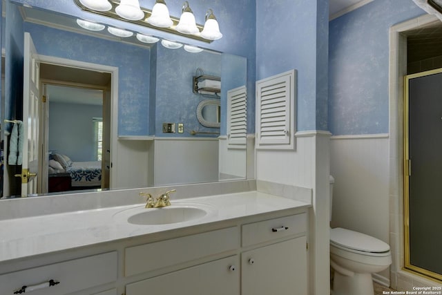 5810 Windvale, Windcrest, TX 78239 - full bathroom featuring a shower stall, ensuite bathroom, toilet, wainscoting, and vanity