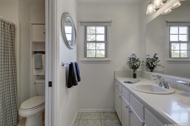 5810 Windvale, Windcrest, TX 78239 - bathroom featuring plenty of natural light, toilet, vanity, and baseboards