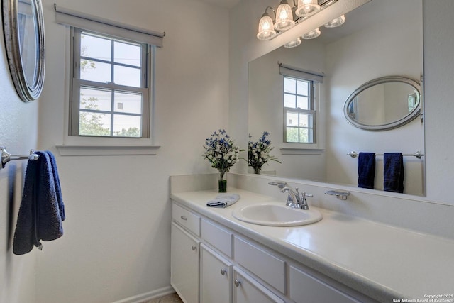 5810 Windvale, Windcrest, TX 78239 - bathroom featuring vanity and a chandelier