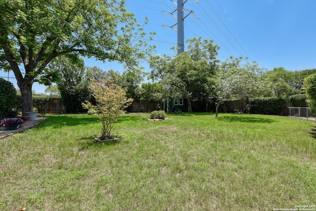5810 Windvale, Windcrest, TX 78239 - view of yard featuring a storage shed and an outbuilding