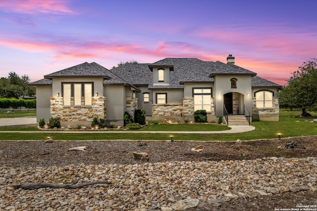 2319 Cascada, Spring Branch, TX 78070 - french country inspired facade featuring stucco siding, stone siding, and a chimney