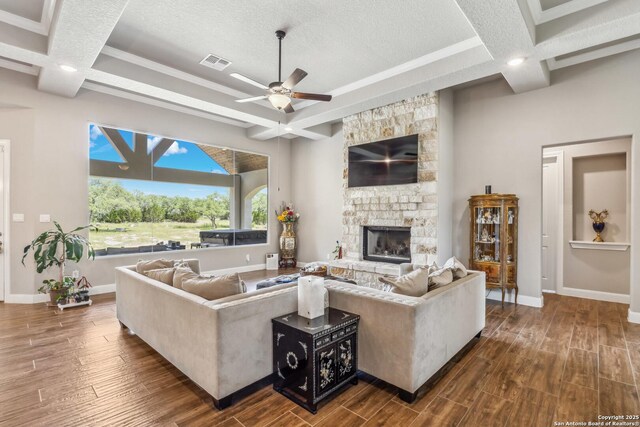 2319 Cascada, Spring Branch, TX 78070 - living area with coffered ceiling, dark wood finished floors, a ceiling fan, beamed ceiling, and baseboards