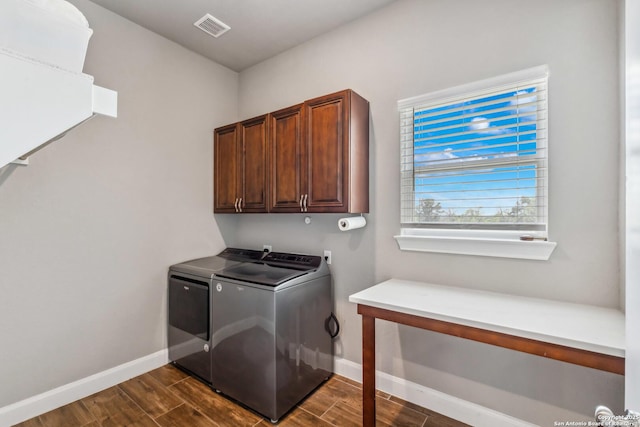 2319 Cascada, Spring Branch, TX 78070 - washroom featuring cabinet space, baseboards, and dark wood-type flooring