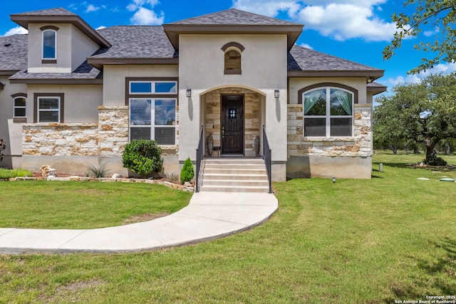 2319 Cascada, Spring Branch, TX 78070 - french country style house featuring stone siding, stucco siding, a front yard, and roof with shingles